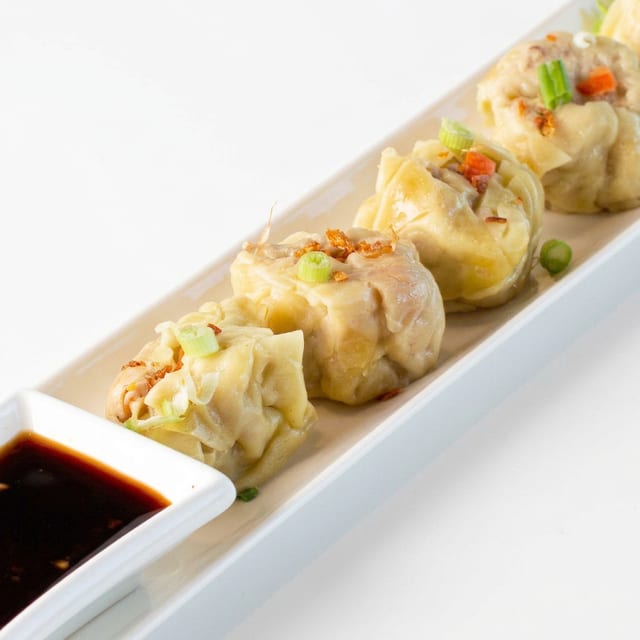 Kanom Jeeb (Thai Shumai).